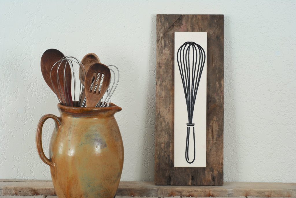 Engraved limestone with Whisk design